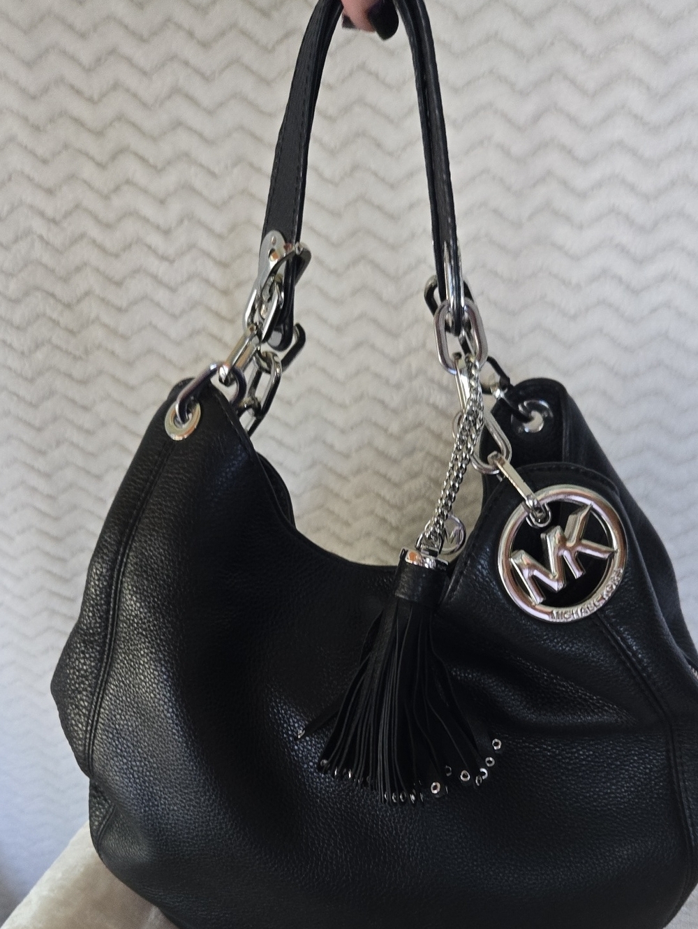 Michael Kors Black Pebbled Leather Hobo with Tassel and Logo Charm
